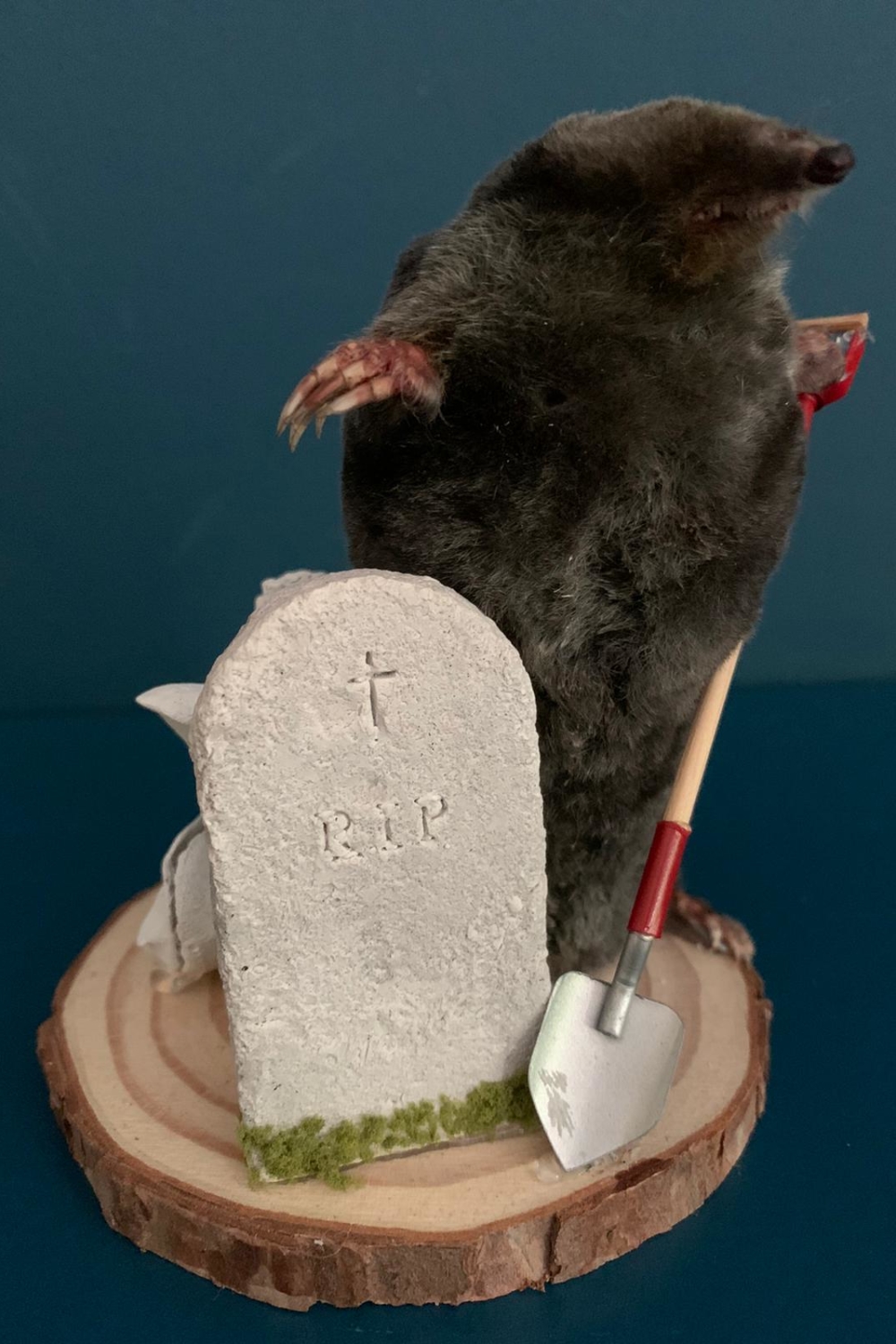 Gravedigging Mole, with spade and tombstone